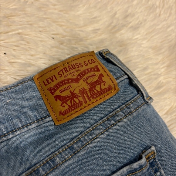 Levi’s 720 High Rise Super Skinny Distressed Raw Hem Light Wash Jeans Size 32 - Picture 9 of 12